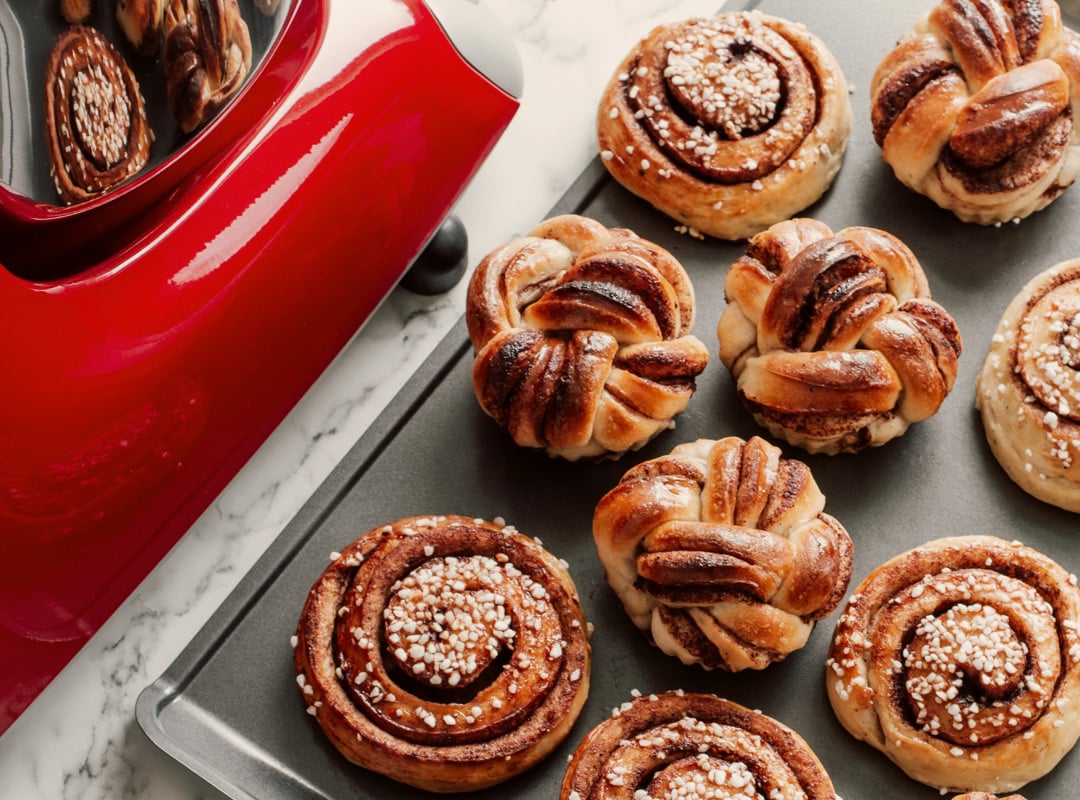 Cinnamon buns on a baking tray