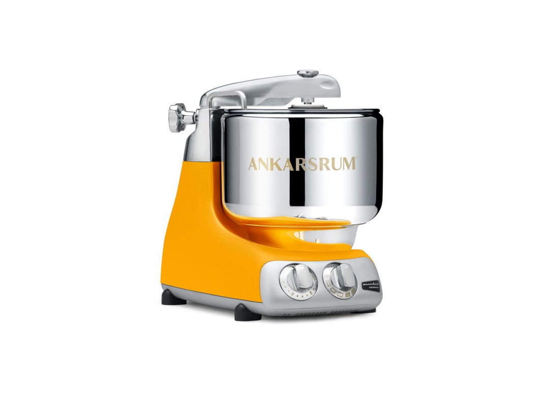 An Ankarsrum Assistent Original in color Sunbeam Yellow on a white background.