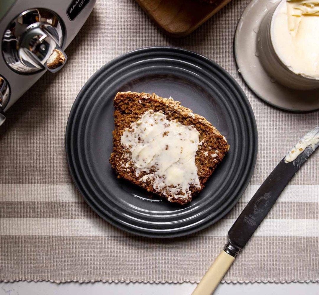 A piece of Irish brown bread on a plate
