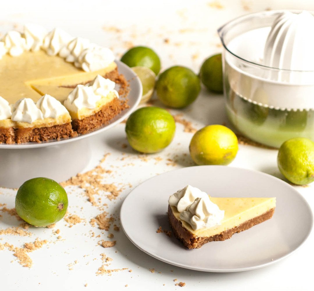 A slice of key lime pie on a plate.