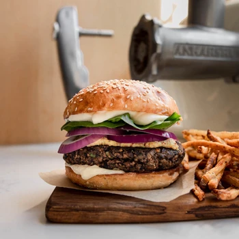 Plant-based Mushroom Walnut Burger prepared from scratch using an Ankarsrum stand mixer to achieve the perfect texture for a delicious meat-free meal.
