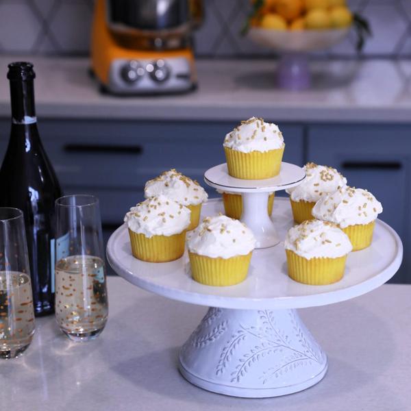 Lemon Prosecco Cupcakes, filled with lemon curd and then topped with Prosecco whipped cream. Cheers to brilliant mixer colors and baking away in the kitchen.