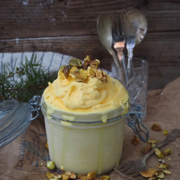 Creamy and incredibly tasty ice cream with saffron, the best spice of Christmas. Easy to make in your Ankarsrum Ice Cream Maker.