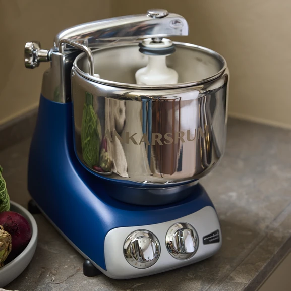 Ankarsrum Assistent Original in Royal Blue on a kitchen countertop.
