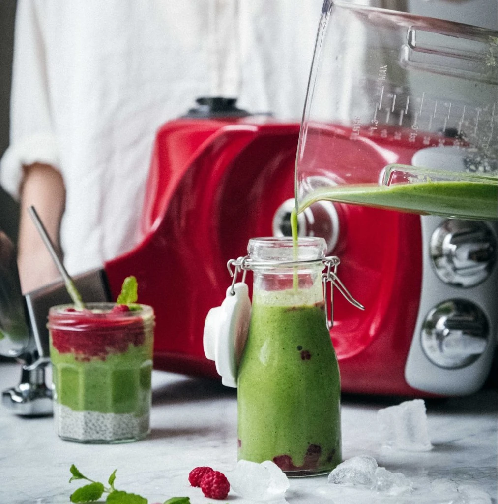 Serve green juice in mason jar just made in kitchen blender with