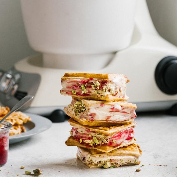 Recipe for Homemade waffle ice cream sandwiches. You can use what flavors and toppings you prefer! Our recipe is with vanilla and raspberries.