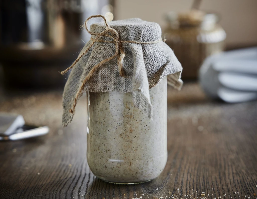 A picture of sourdough in a glass jar
