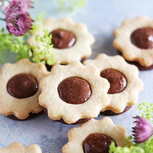 Home made ballerina biscuits by @mykitchenstories.se. Two varietes of pastry, chocolate and vanilla, filled with dreamy nougat. 