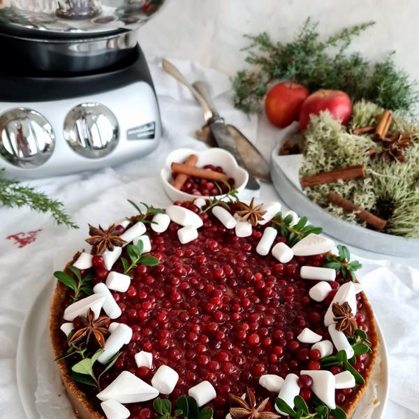 Christmas Cheesecake decorated with Lingonberries and Star Anise