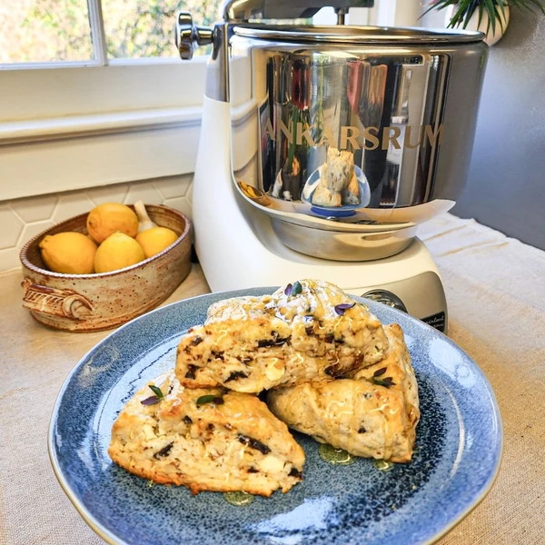 Savory Scones: Freshly baked, homecrafted delights featuring a flavorful blend of herbs, goat cheese, figs, and pecans.