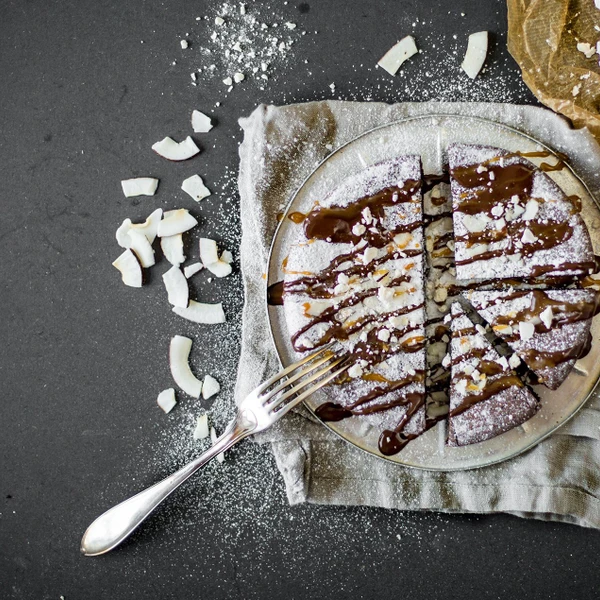 A trick to make a regular chocolate cake feel really luxurious is to add a good amount of garnish. 