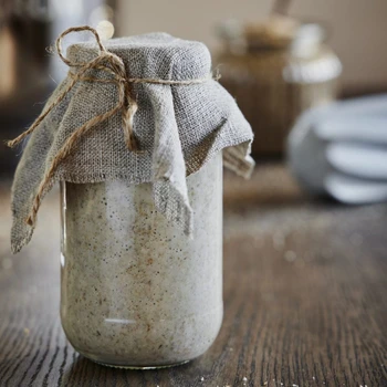 A picture of sourdough in a glass jar