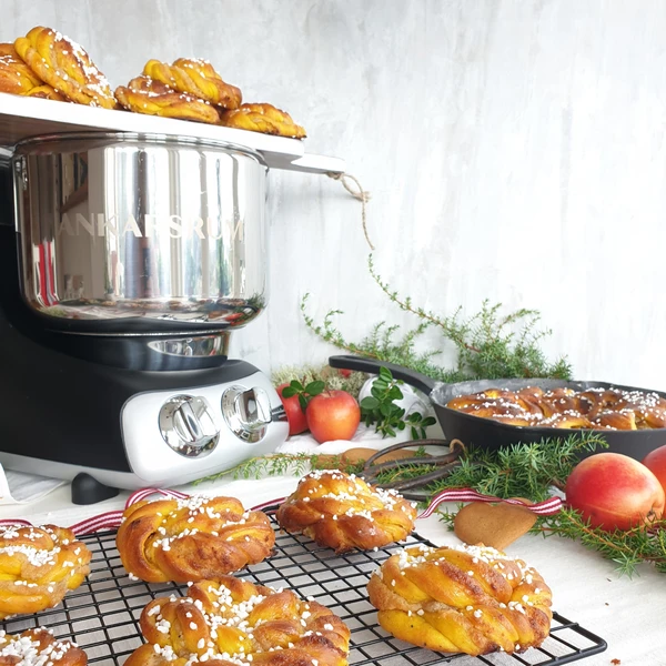 Saffron Buns with Almond Paste presented on a tray