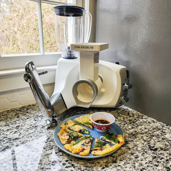 Asian crepes filled with fresh vegetables served with spicy dipping sauce